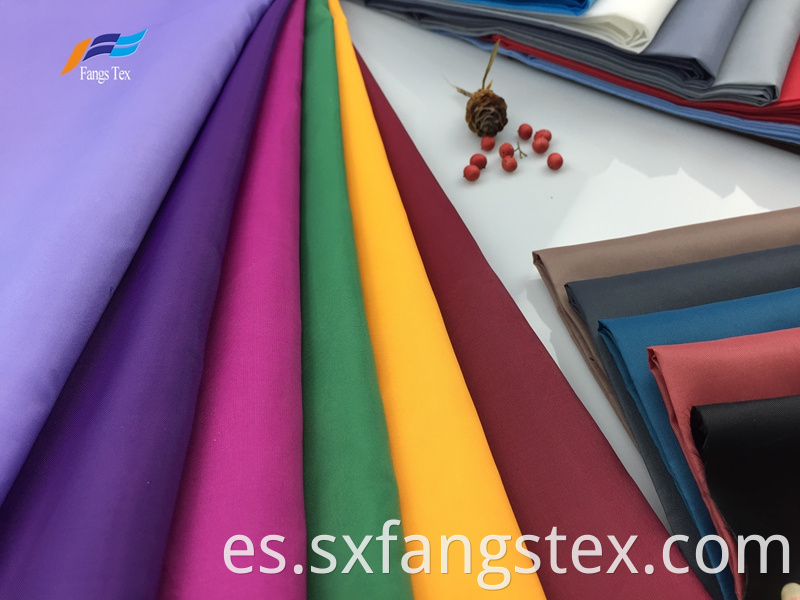 100% Polyester Waterproof Dyed Taffeta PU Garemnt Fabric 1
